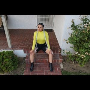 Neon yellow long sleeve bodysuit